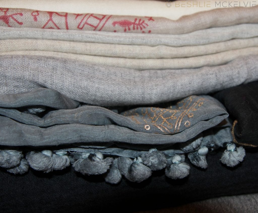 Layered folded scarves made with local communities in Nepal
