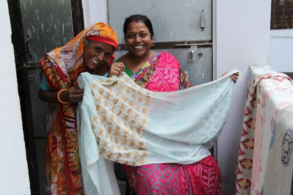 Indian ladies hold the fruits of their labour, a beautiful hand printed scarf