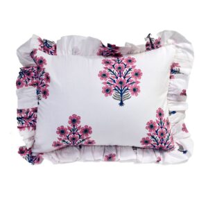This is a white, frilly cushion adorned with a hand block printed floral pattern in pink and blue. It is made from organic cotton by women in Jaipur, India.