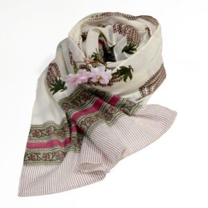 Hand block printed on organic cotton scarf with a soft pink and olive green base, intricate floral patterns in muted white, cream, and beige tones, and a delicate striped border, showcasing traditional Indian block print techniques for an elegant, eco-friendly accessory.