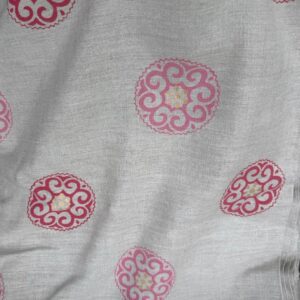 Raspberry Mandala Linen fabric laid flat